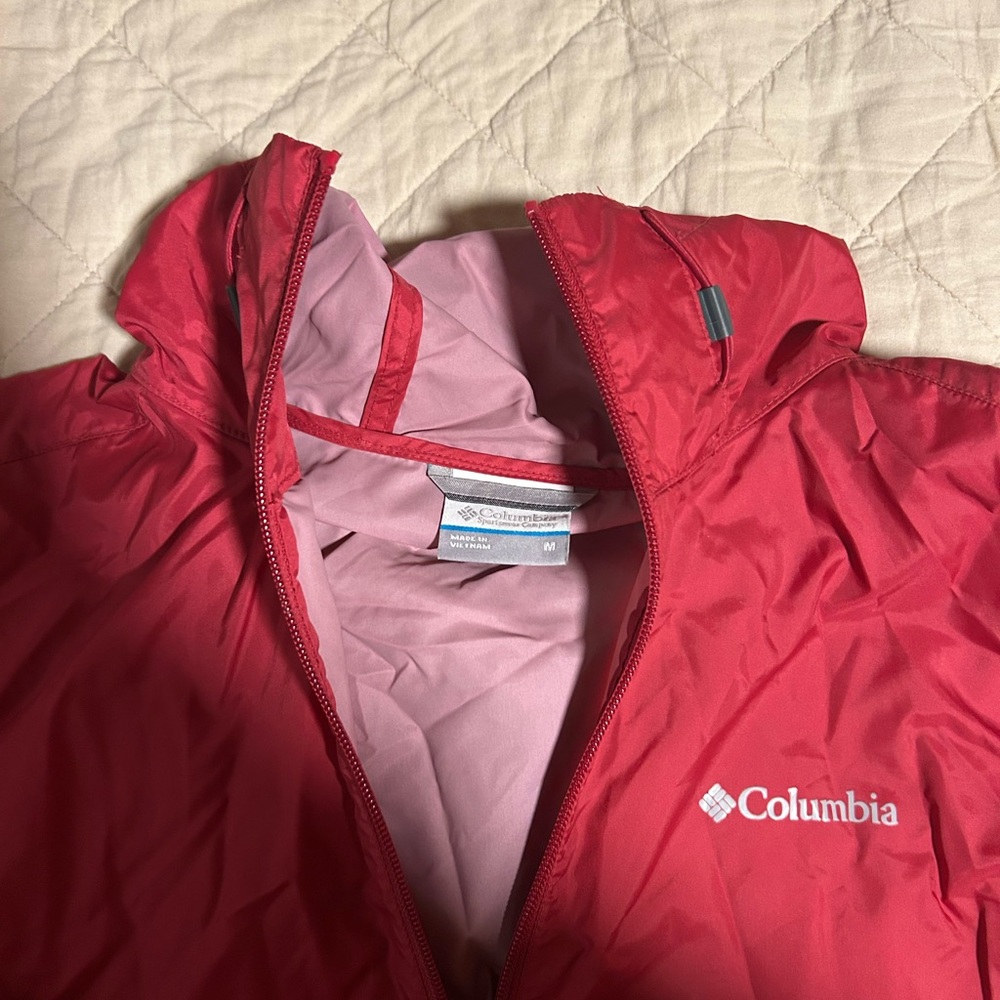 women’s Columbia jacket, pink size Medium.